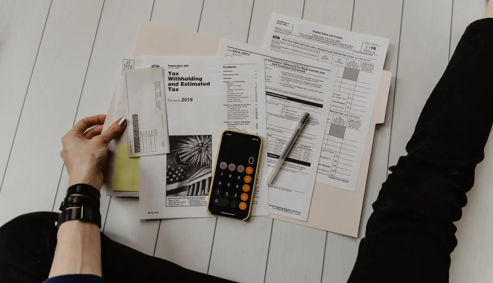 Documents and paperwork laid out on a desk